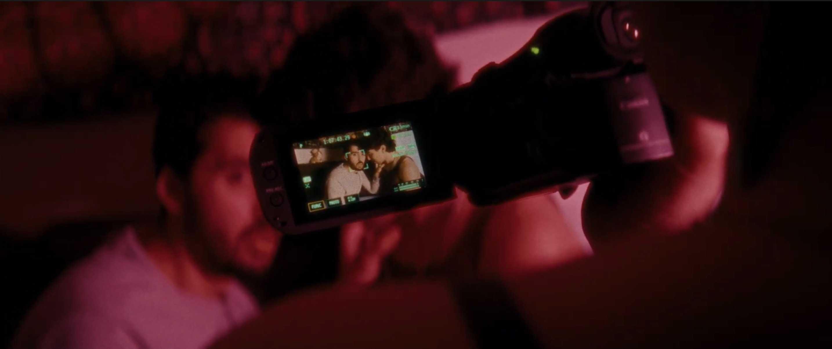 Behind-the-scenes camera view of Santiago Henao performing in Flux