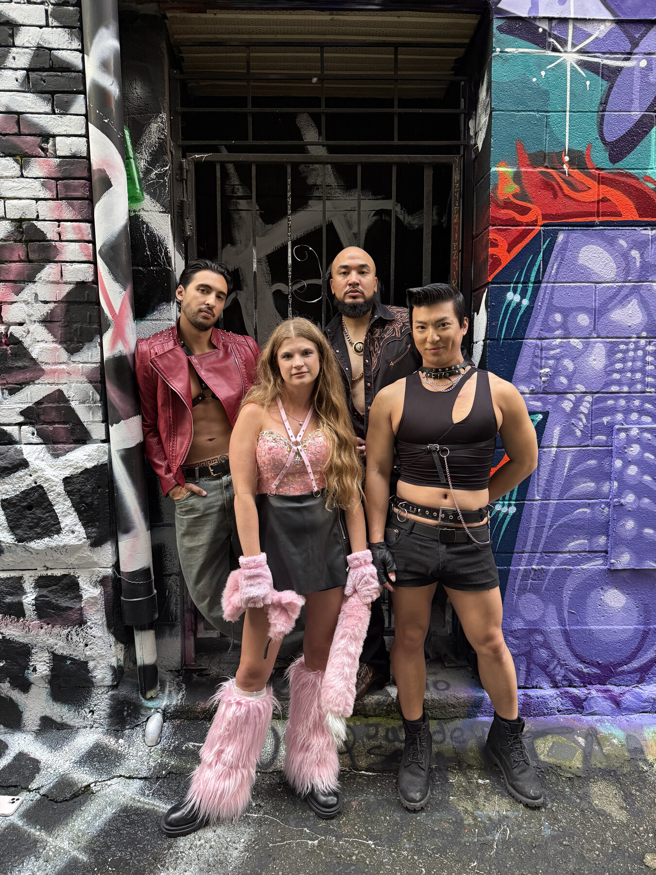 Santiago Henao with three cast members from Les Immigrants
