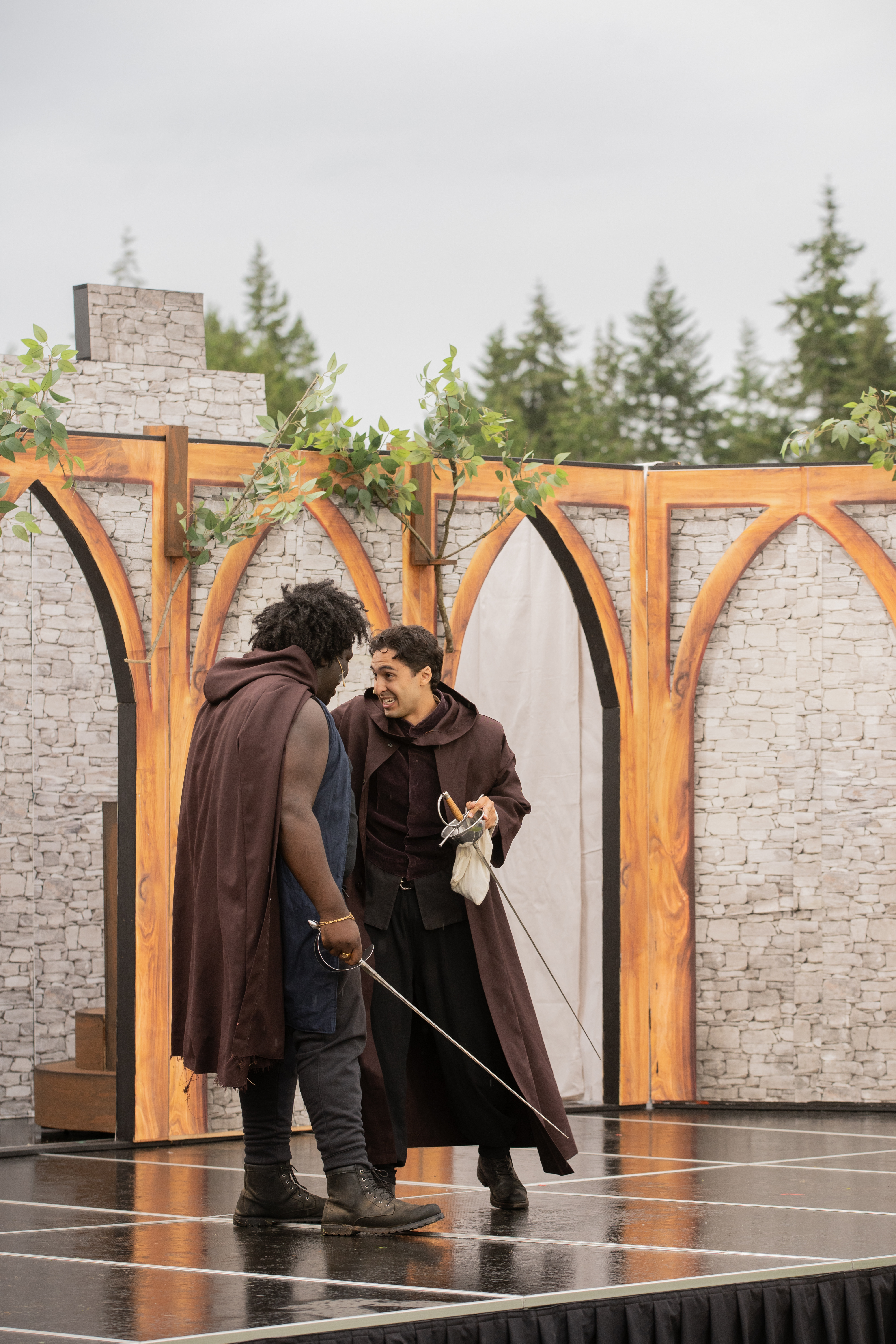Santiago Henao performing with the King Henry IV cast outdoors